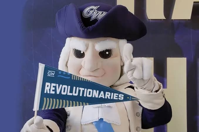 George, the GW mascot, holding a Revolutionaries pennant